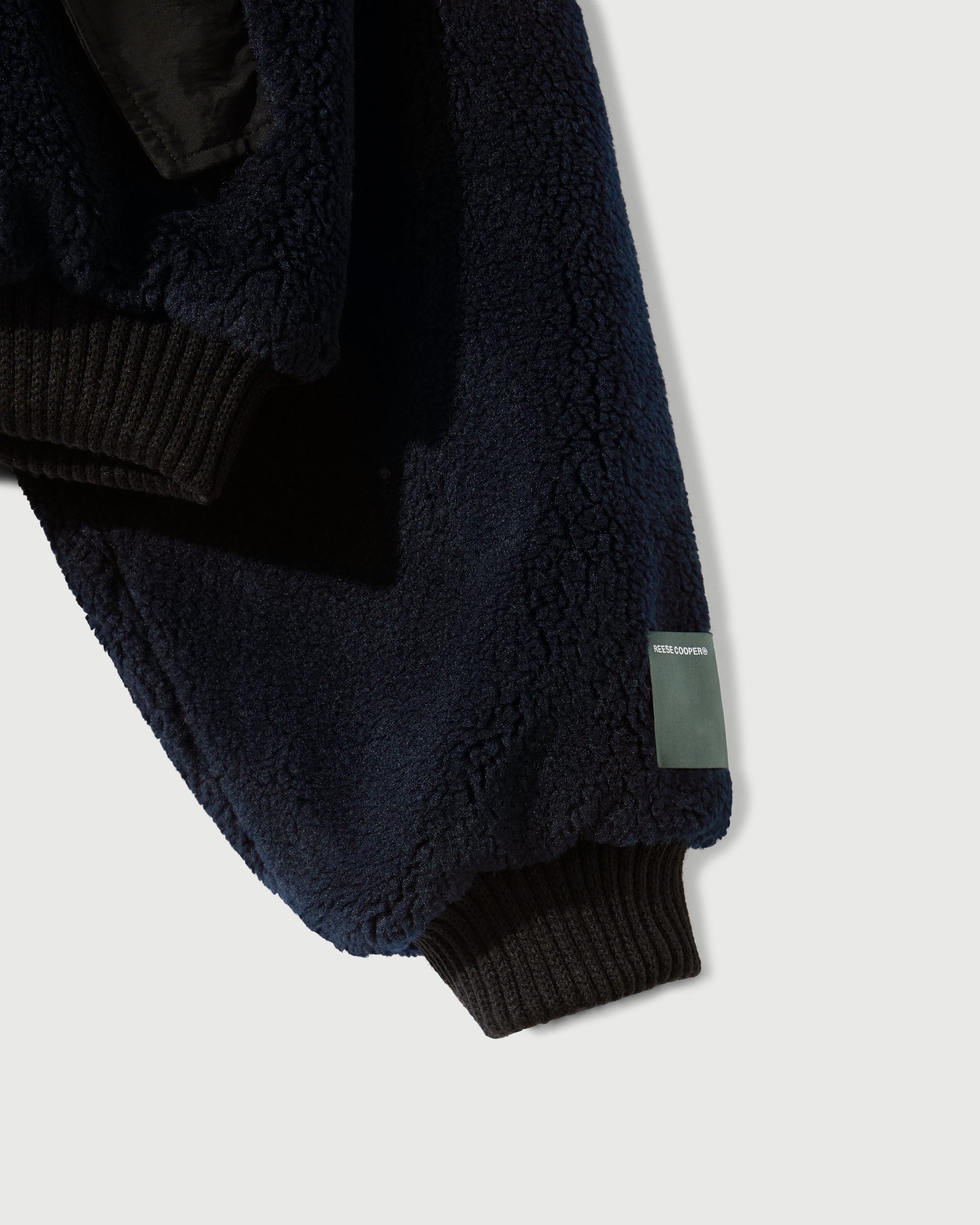 Sherpa Fleece Bomber Jacket in Navy & Black