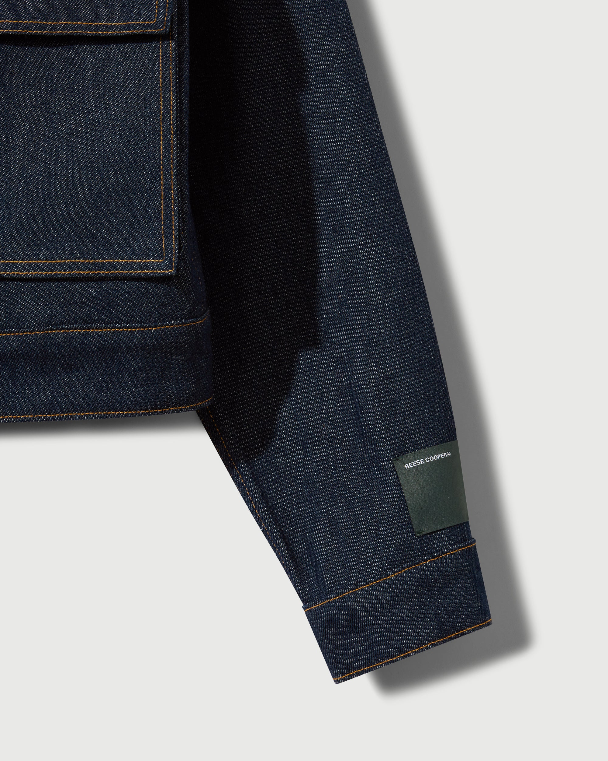 Raw Denim Concealed Button Trucker Jacket